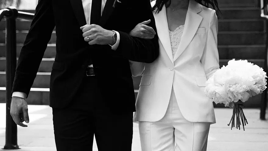 A couple walking down an aisle