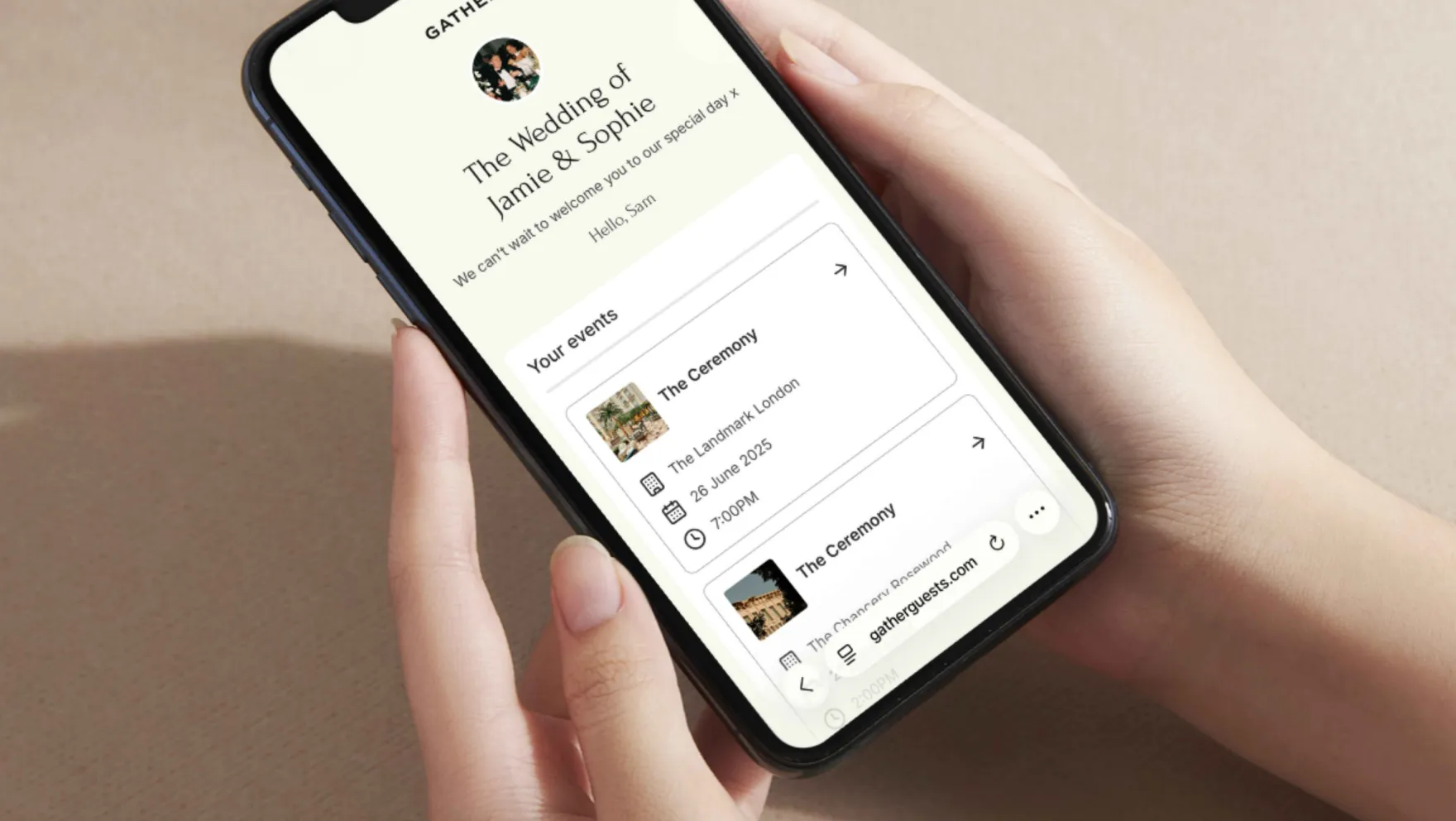 A hand holding a phone with the Gather app loaded